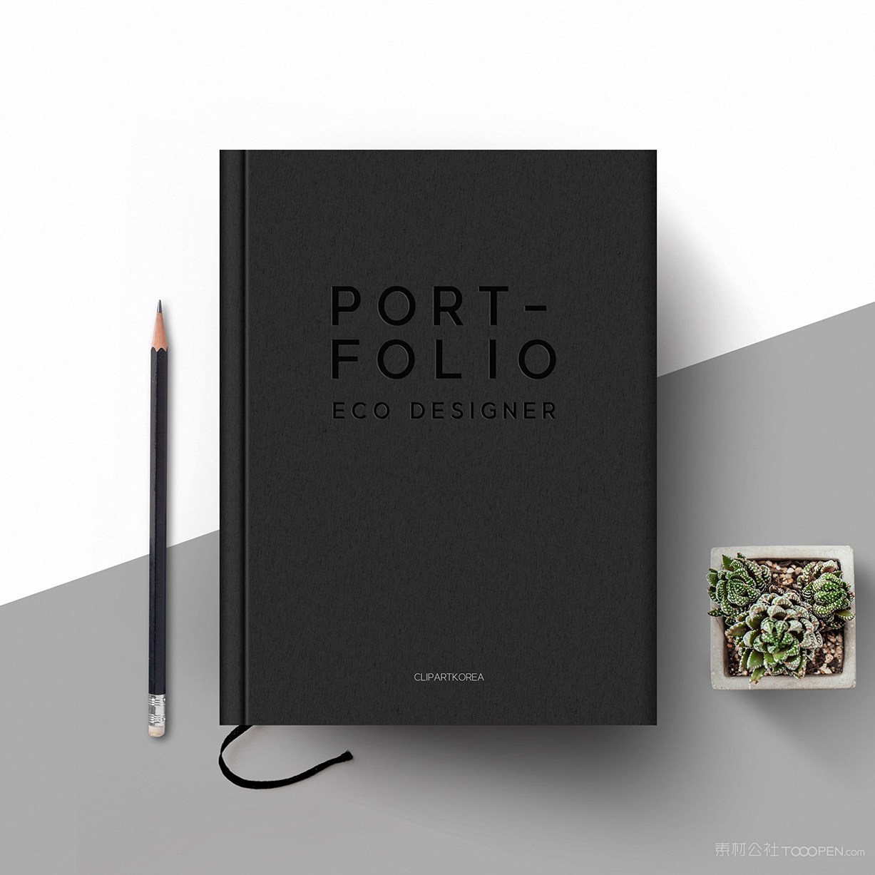 多肉旁边的黑色精装工作记事本样机