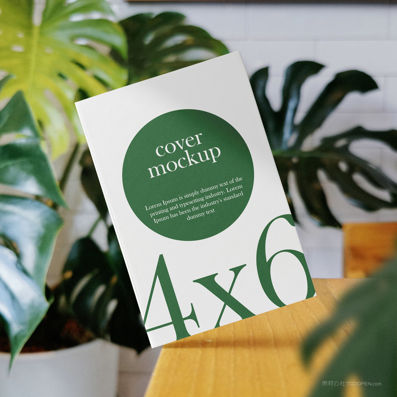 桌面上悬浮的画册书籍封面贴图样机