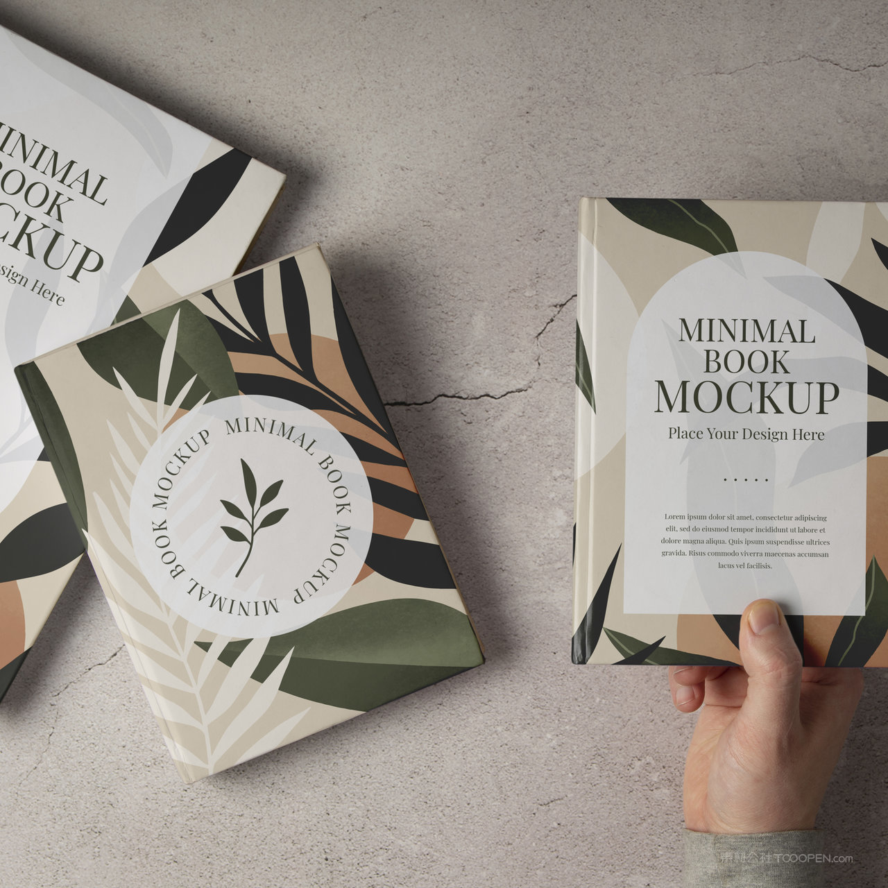 手拿精美的书籍画册封面贴图样机