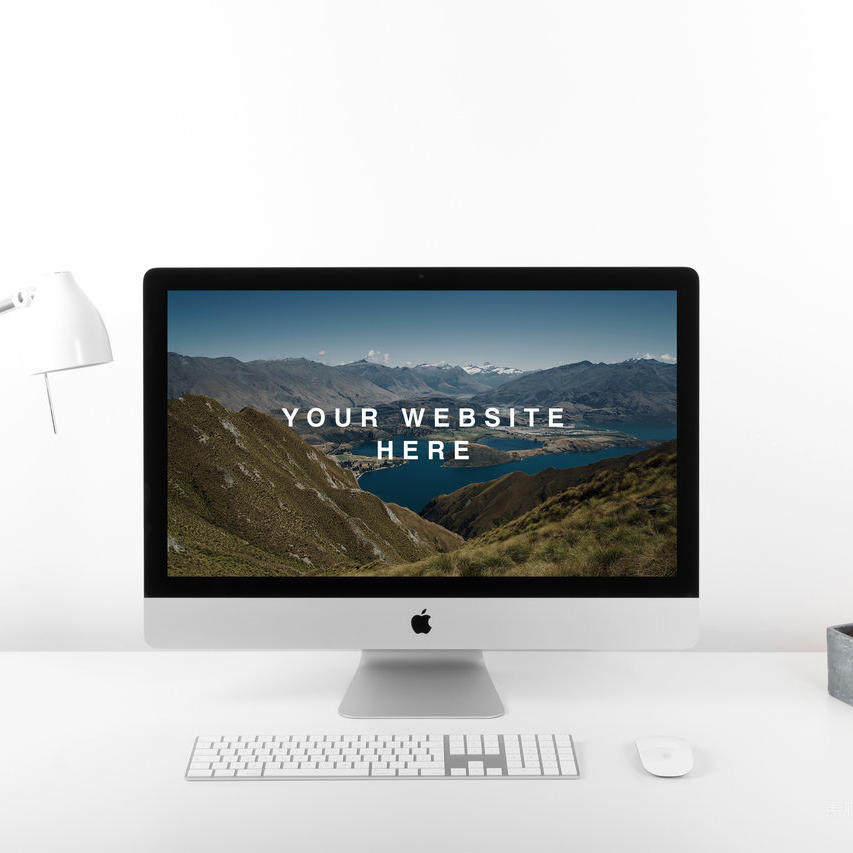 白色干净的书桌上的苹果电脑样机素材