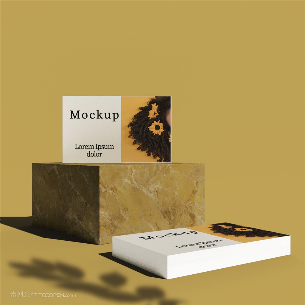 黄色背景石块上的卡片贴图样机