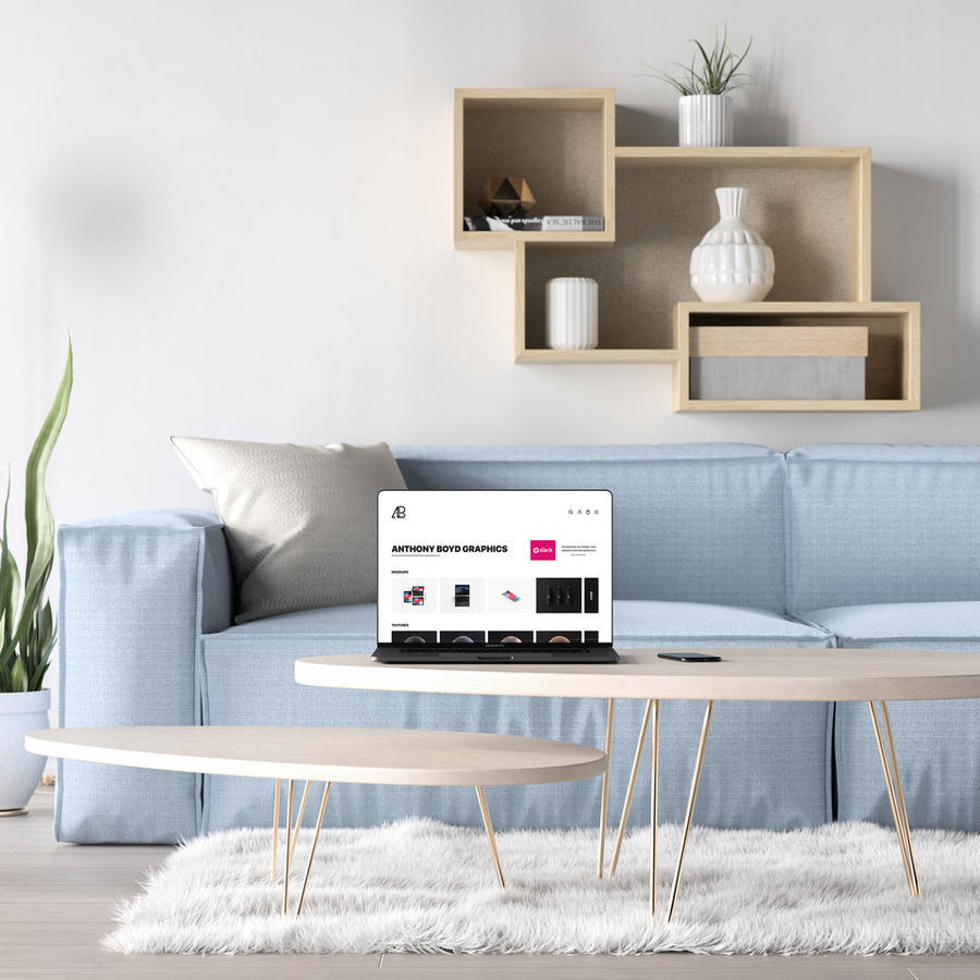 客厅茶几上的笔记本电脑贴图样机