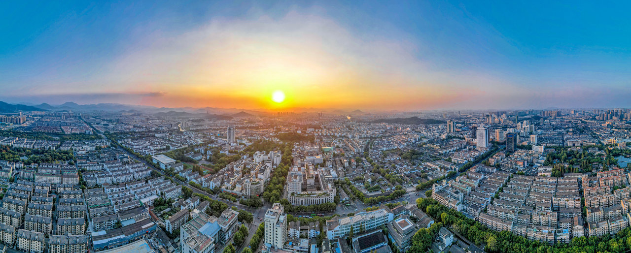 航拍浙江绍兴城市日落全景图