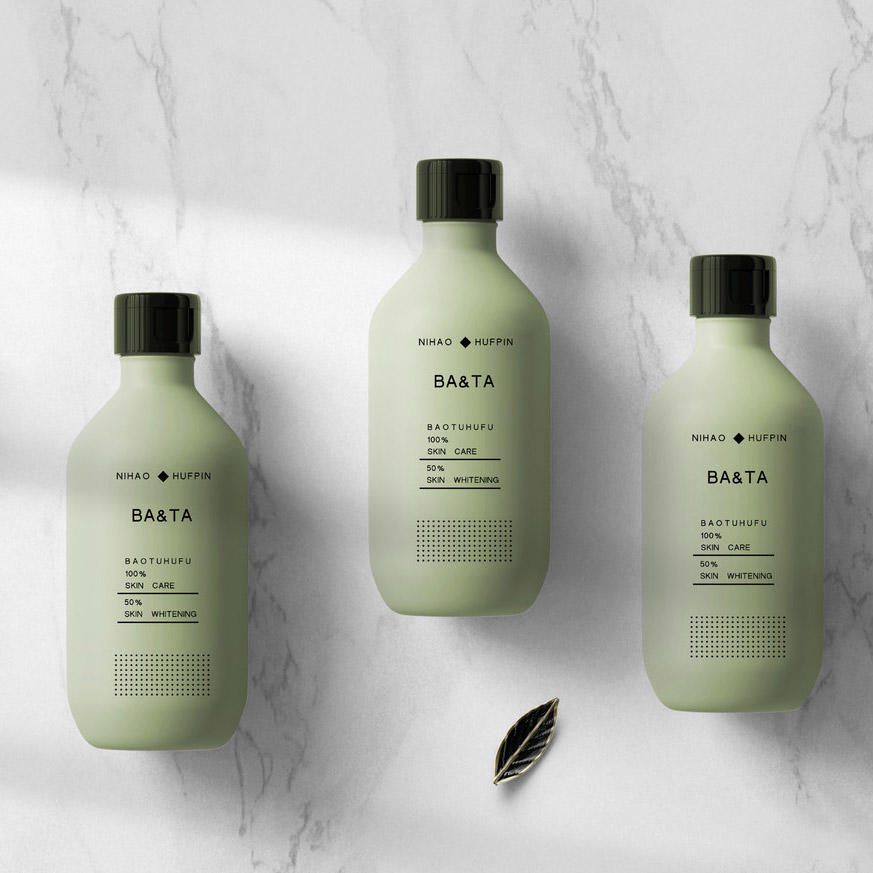 大理石面上的抹茶绿色瓶子包装贴图样机